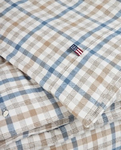 Rutet sengesett i bomullsflanell, dempet blå/hvit